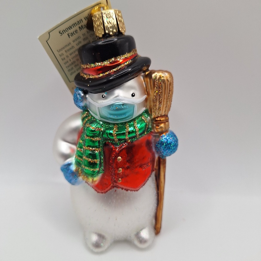 Old World Christmas Snowman with‎ a Face Mask Blown Glass Christmas Ornament